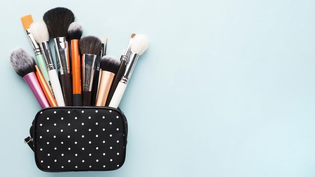 small bag with makeup brushes. Resolution and high quality beautiful photo