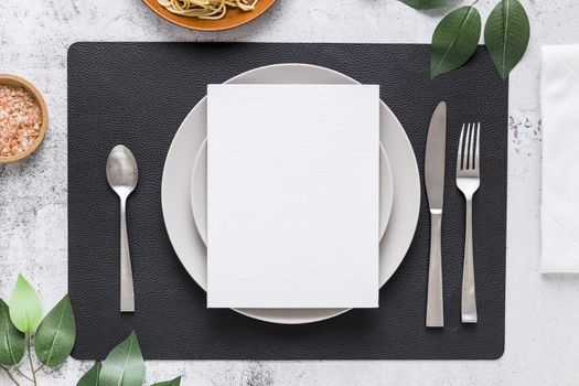 top view blank menu paper plate with cutlery leaves. Resolution and high quality beautiful photo