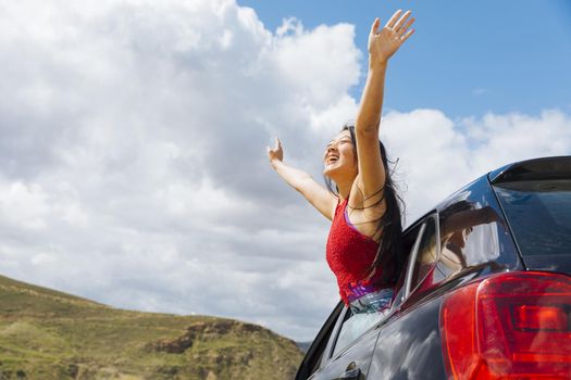 joyful young woman raising hands sky. Resolution and high quality beautiful photo