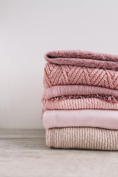 stack knitted sweaters floor2. Resolution and high quality beautiful photo