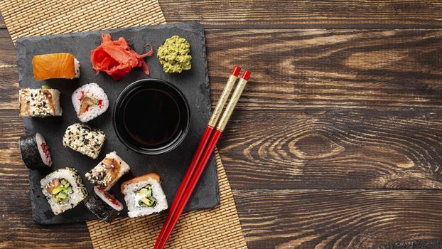 flat lay mix maki sushi rolls chopsticks with copy space. Resolution and high quality beautiful photo