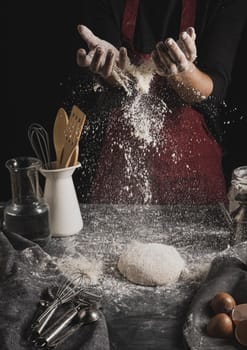 front view baker hands spreading flour. Resolution and high quality beautiful photo
