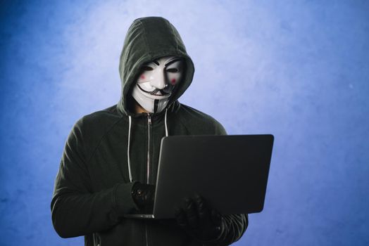 hacker with anonymous mask. Resolution and high quality beautiful photo