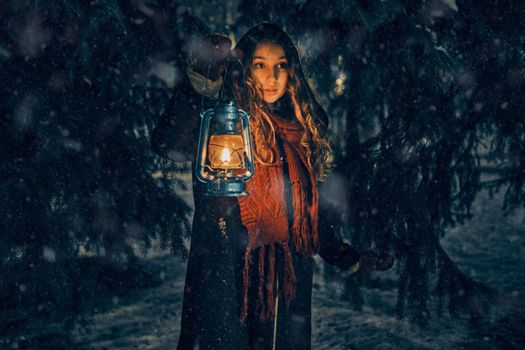 Young girl with lantern in winter forest fairy tale, book cover, christmas time