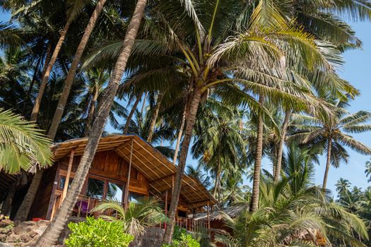 Wooden bungalows on Colva Beach, South Goa, India