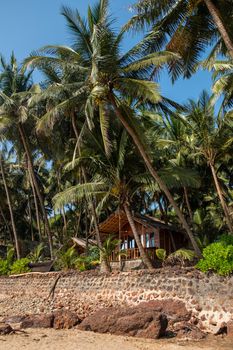 Wooden bungalows on Colva Beach, South Goa, India