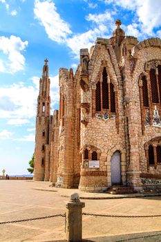 Novelda, Alicante, Spain- September 24, 2021: Details, archs, tower and pictures of Sanctuary of Santa Maria Magdalena on the top of the mountain in Novelda, Alicante, Spain.