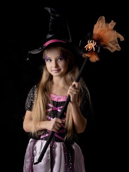 Cute halloween witch girl in fantasy costume, positive character, isolated on black background