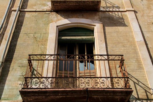 Old colorful and majestic tiled facade in Novelda, Alicante, Spain