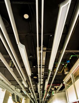 Lamps, water pipes, electrical power and communication system ducts, Ceiling mounted