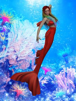 A red mermaid swims through a coral reef with multi-colored hair.