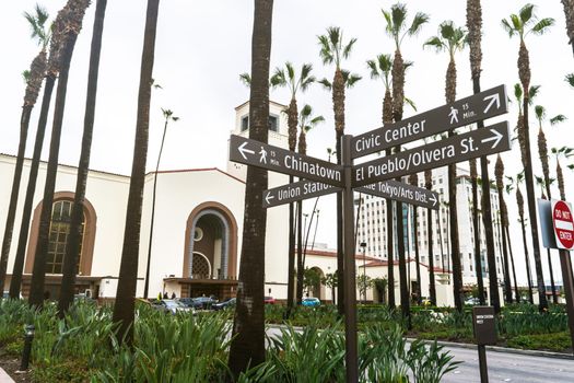 Street signs and in the background is Union Station located in Los Angeles - USA
