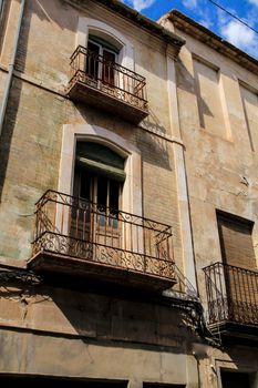 Old and majestic facades in Novelda, Alicante on a sunny day of summer