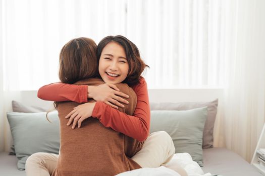 Two asian friend ship women in room,like lovely lesbian couple.