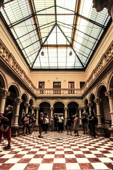 Novelda, Alicante, Spain- September 18, 2021: Beautiful courtyard with skylight and marble columns of the Gomez-Tortosa Center Modernist house in Novelda