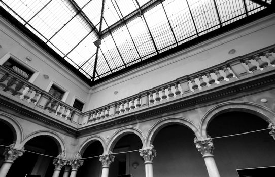 Novelda, Alicante, Spain- September 18, 2021: Beautiful courtyard with skylight and marble columns of the Gomez-Tortosa Center Modernist house in Novelda
