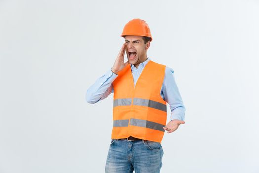 Angry builder or constructor yelling at somebody as fury concept isolated on white background with copyspace