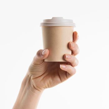 hand holding coffee cup. Beautiful photo