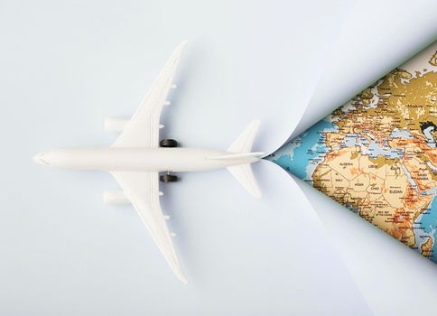 Photo Top view white toy plane and map. Resolution and high quality beautiful photo