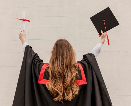 front view graduated girl with back. Beautiful photo