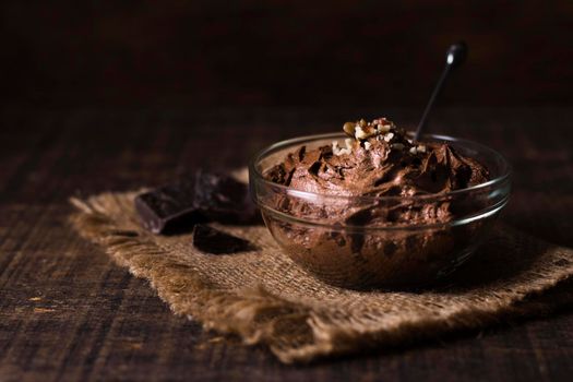 close up delicious chocolate mousse ready be served. High resolution photo