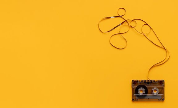 cassette tape yellow background. High resolution photo
