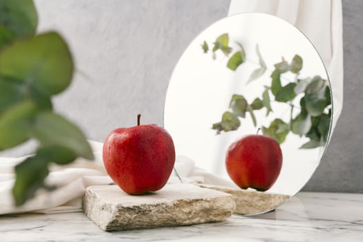 fresh apple beside mirror. Resolution and high quality beautiful photo