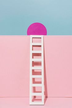 white ladder with pink circle. Beautiful photo