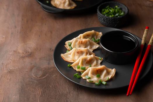 high angle traditional asian dish with chopsticks herbs. Beautiful photo