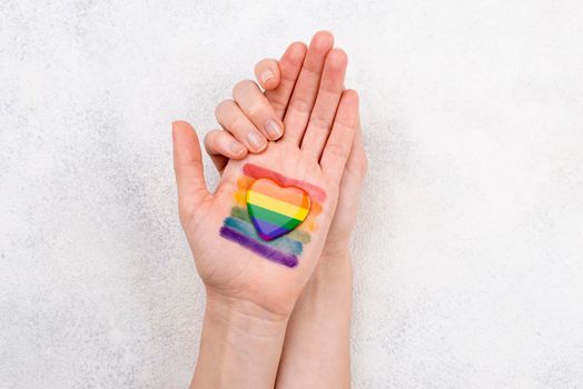 rainbow flag painted hand. Beautiful photo