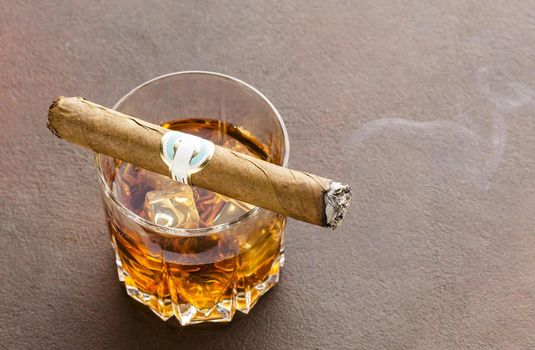 high angle whiskey glass with ice cigar 2. Resolution and high quality beautiful photo