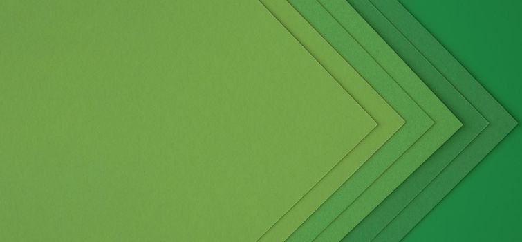 layers green papers creating abstract arrows. Resolution and high quality beautiful photo