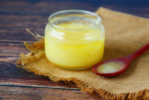 homemade ghee in container on a table