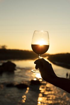 glass wine with sun shinning back. Resolution and high quality beautiful photo