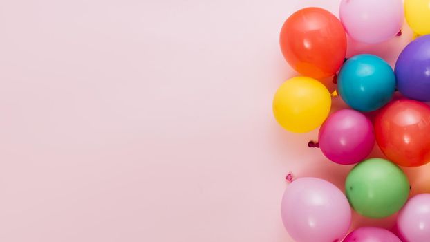 inflated colorful balloons pink backdrop with space writing text. Resolution and high quality beautiful photo
