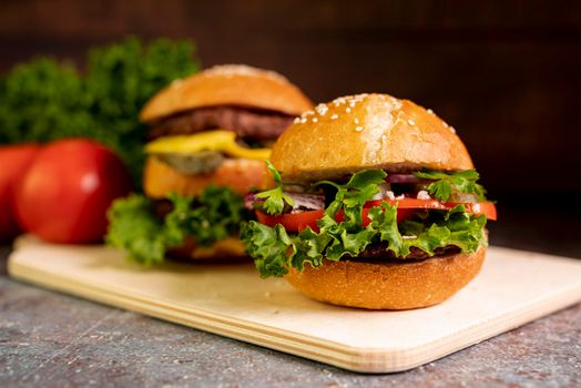 close up hamburgers cutting board. High resolution photo
