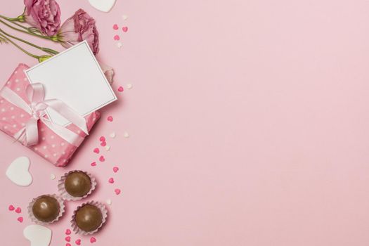flowers near post card present box chocolate candies. Resolution and high quality beautiful photo