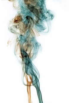Image of Orange and teal smoke twisting together and mixing on a white background