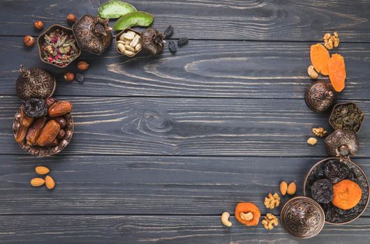 frame made different dried fruits with nuts. Beautiful photo