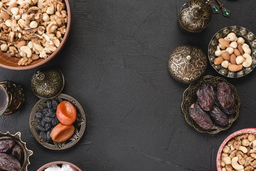 fresh dried fruits nuts dates ramadan black backdrop. Resolution and high quality beautiful photo