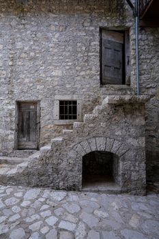 Tramonti di Sotto, Italy. September 2021.  The inner courtyard of an ancient rural building in northern Italy