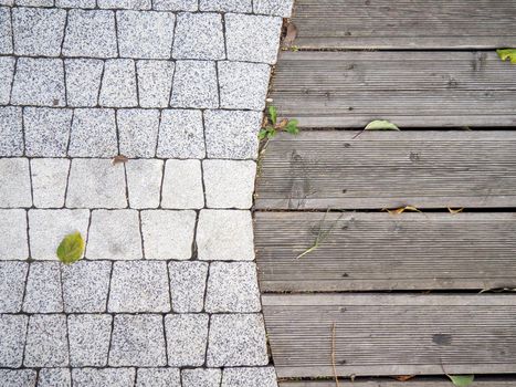 Stonework and wooden floor. Street pattern