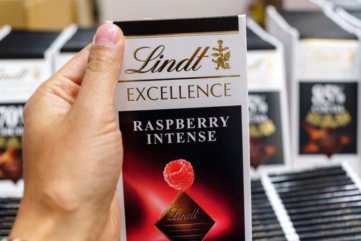 Volzhsky, Russia-September 21, 2021: Lindt chocolate shop in shopping center. With raspberry intense