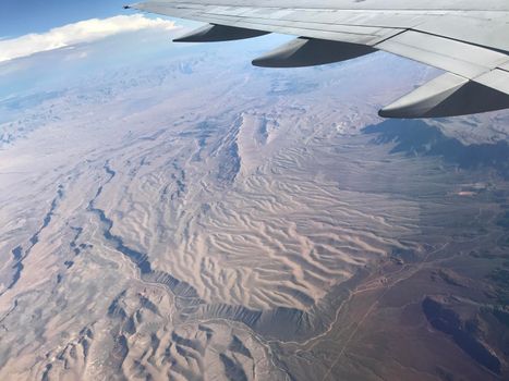 View from airplane wing of western United States ripple texture