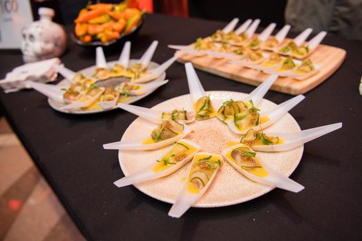 Asian Spoon appetizers with cucumber and garnish