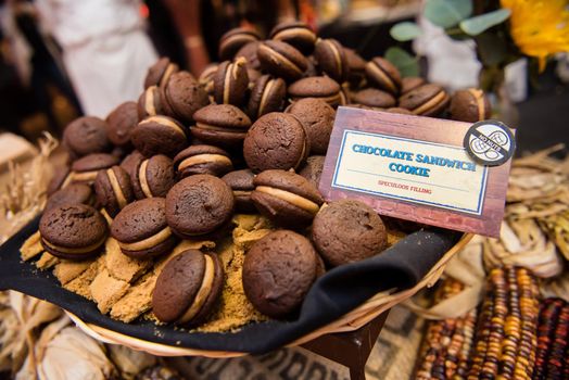 Chocolate sandwich cookie with cream filling. Dessert close up