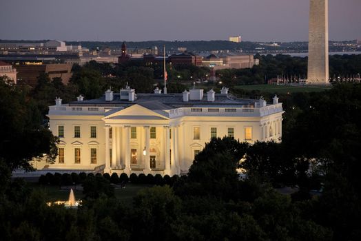 White House DC skyline at night with view of the Washington Monument at sunset