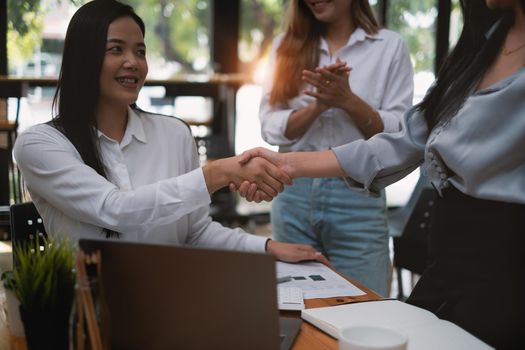 Business partnership meeting concept. Image businessmans handshake. Successful businessmen handshaking after good deal. Group support concept