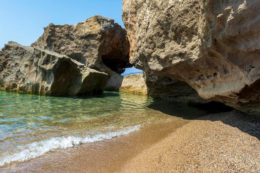 Rocky beach closeup in the seaside Messenian area during the summer period. Messenia, Peloponnese, Greece.