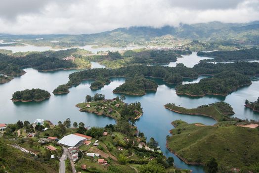 View at the top of El Penon de Guatape looking out at a beautiful view of the lagoon.